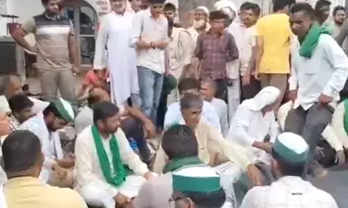 भाकियू ने घेरा थाना, धरना देकर किया हंगामा